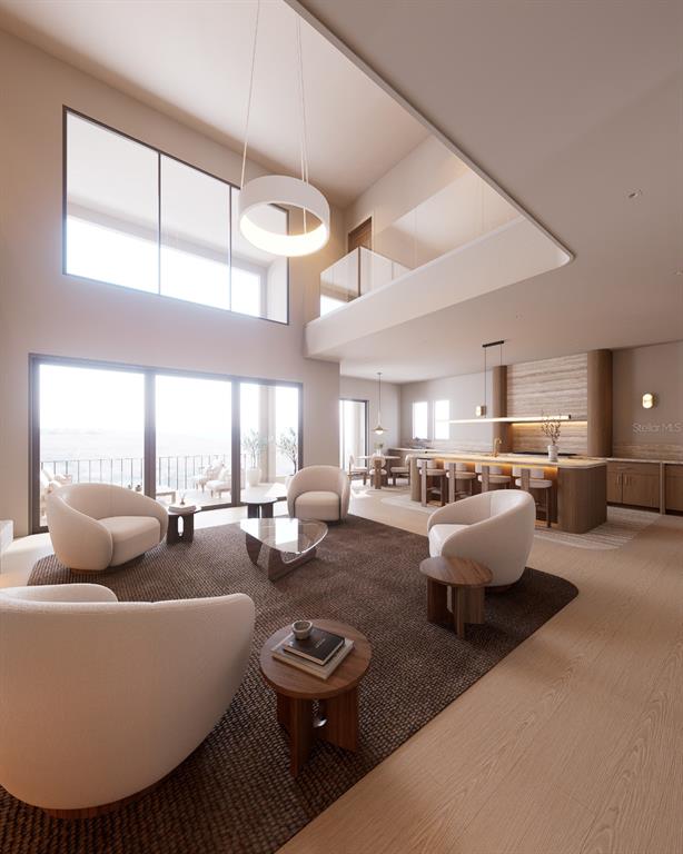 This rendering shows a modern open-concept living area with high ceilings, neutral furniture, and wood flooring — 817 BAY POINT DRIVE, MADEIRA BEACH, FL