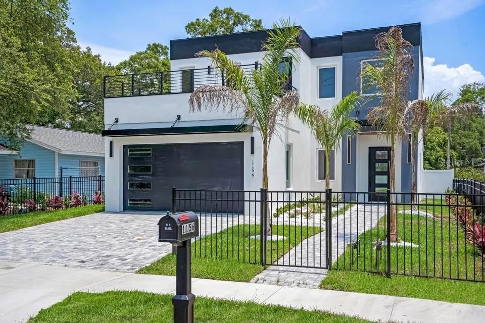 This is a floor plan showing the layout of an upper level with three bedrooms — 1156 COCOANUT AVENUE, SARASOTA, FL