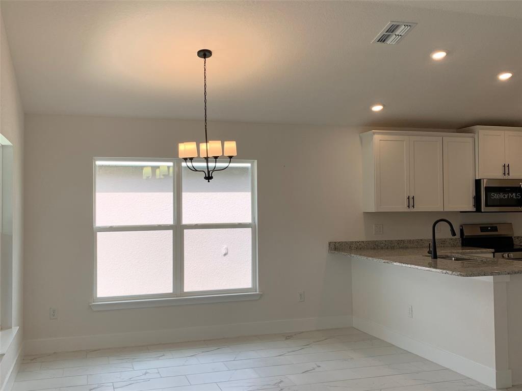 11603 GRACE ROAD, WEEKI WACHEE, FL — photo 4 of 15