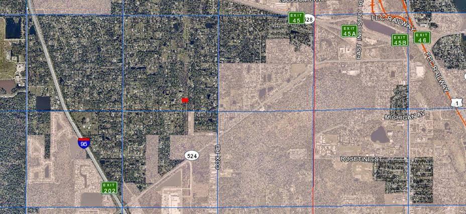 This is a satellite map showing the location of a property near Interstate 95 — TBD RAYBURN ROAD, COCOA, FL