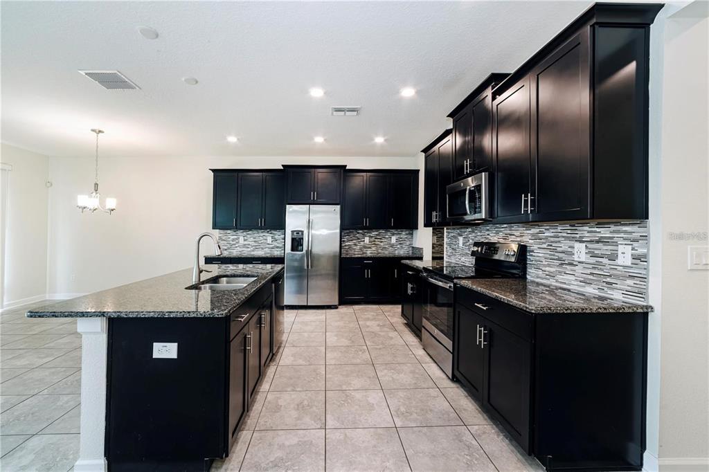 9850 MAGNOLIA WOODS BOULEVARD, ORLANDO, FL — photo 5 of 28