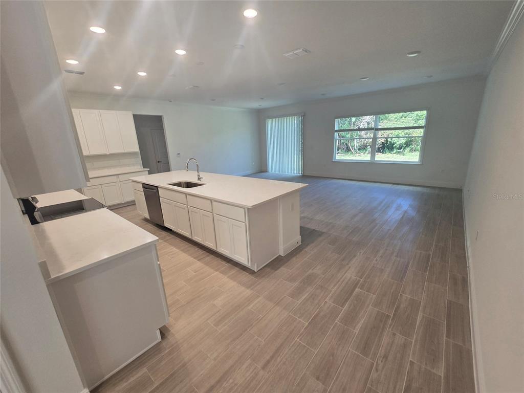 This is a floor plan for a single-story house with three bedrooms and a garage — 2631 FAIRFAX AVENUE, NEW SMYRNA BEACH, FL