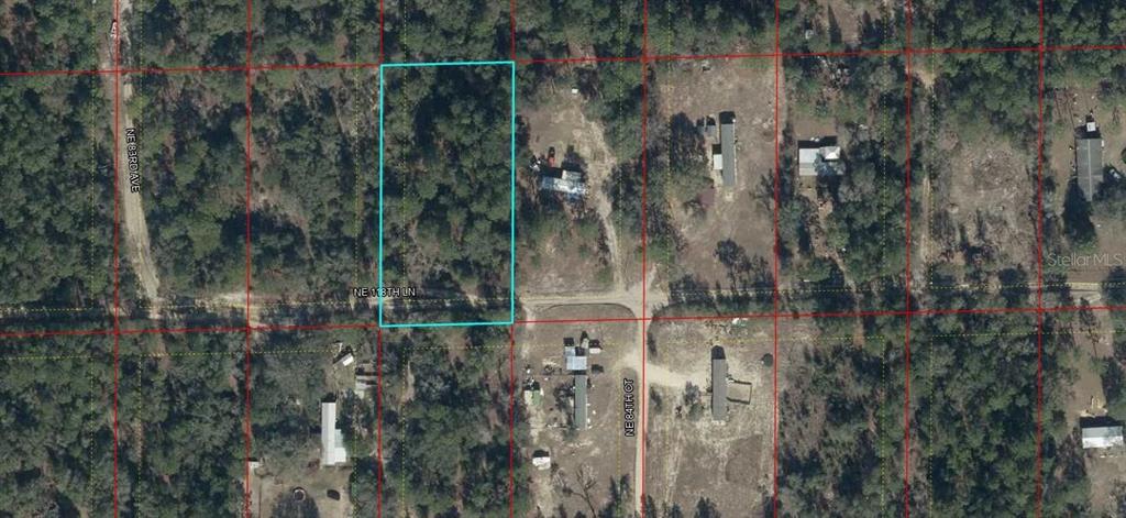 An aerial map view shows a rectangular plot of land outlined in light blue — NE 118TH LANE, BRONSON, FL