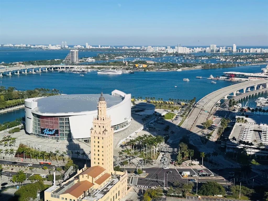 An aerial view of the Kaseya Center, Freedom Tower, and surrounding Miami waterfront — 121 NE 5TH STREET UNIT 1500, MIAMI, FL
