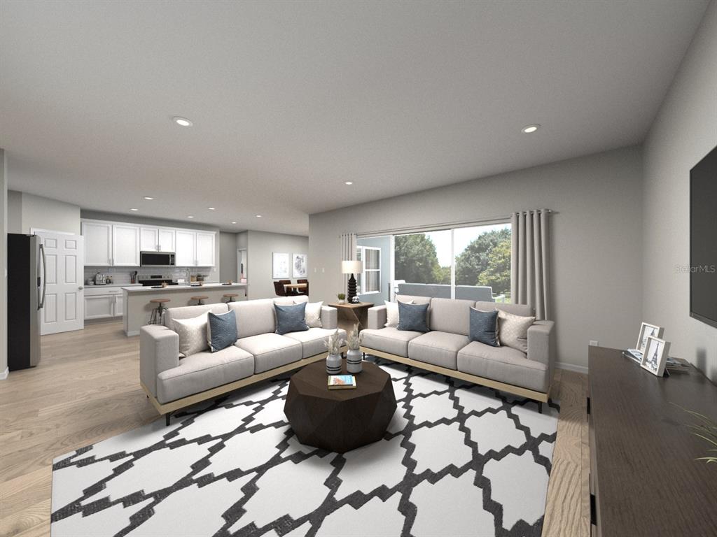 This is a digital rendering of an open-concept living room and kitchen with light flooring — 405 BROOKHAVEN TRAIL, ORMOND BEACH, FL