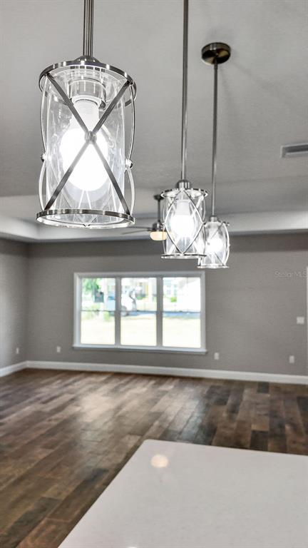A five-blade ceiling fan with a central light fixture is mounted on a white ceiling — 9100 DORIE DRIVE, TRENTON, FL
