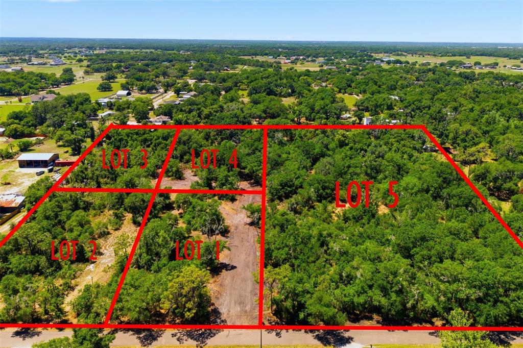 An aerial view shows five plots of land outlined in red on a wooded lot — 19084 RED BIRD LANE LOT 3, LITHIA, FL