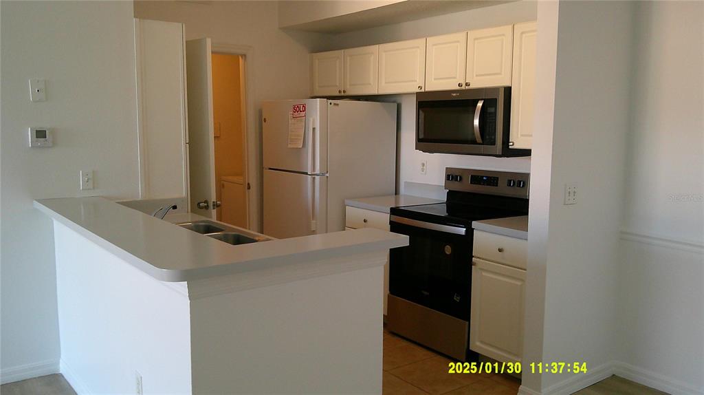 5548 METROWEST BOULEVARD UNIT 306, ORLANDO, FL — photo 3 of 23