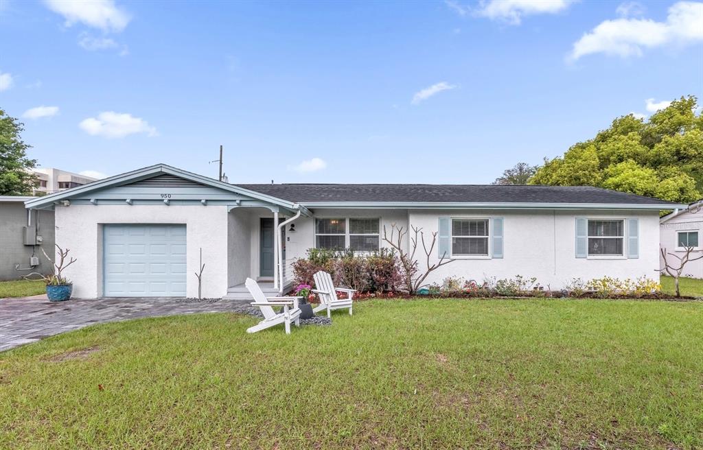 An aerial view shows a house with a white outline situated near a lake — 950 HANOVER AVENUE, WINTER PARK, FL