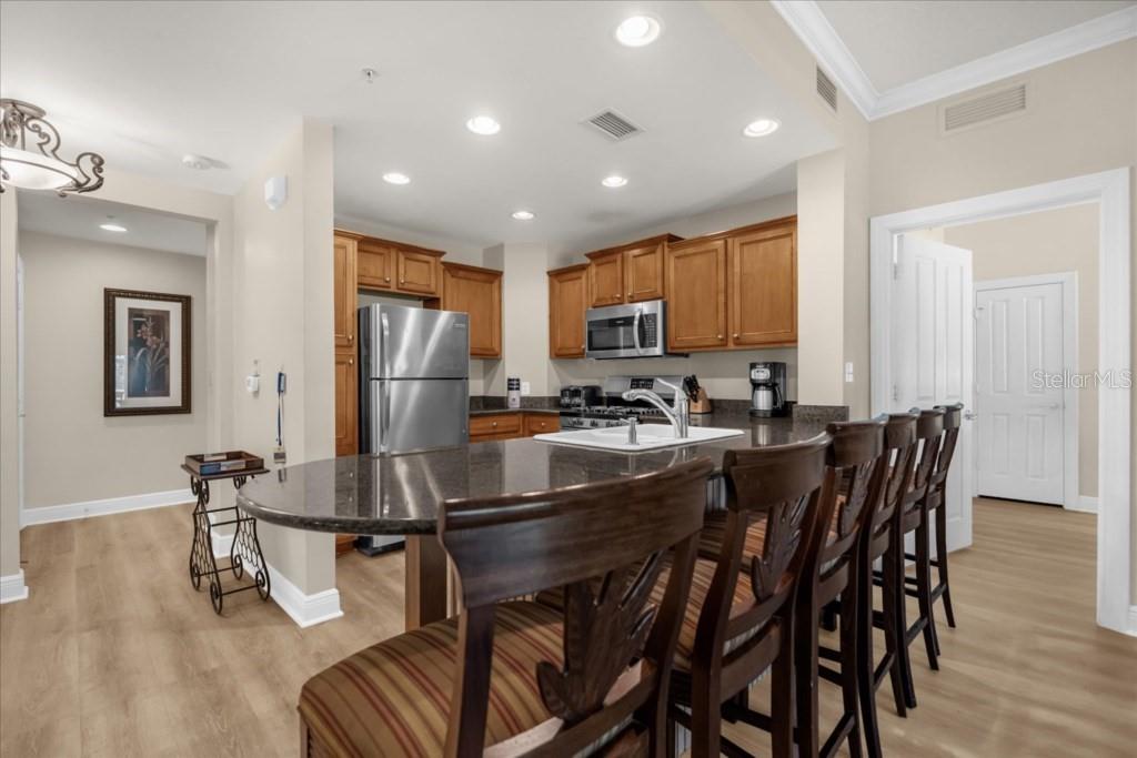 7697 HERITAGE CROSSING WAY UNIT 101, REUNION, FL — photo 5 of 27