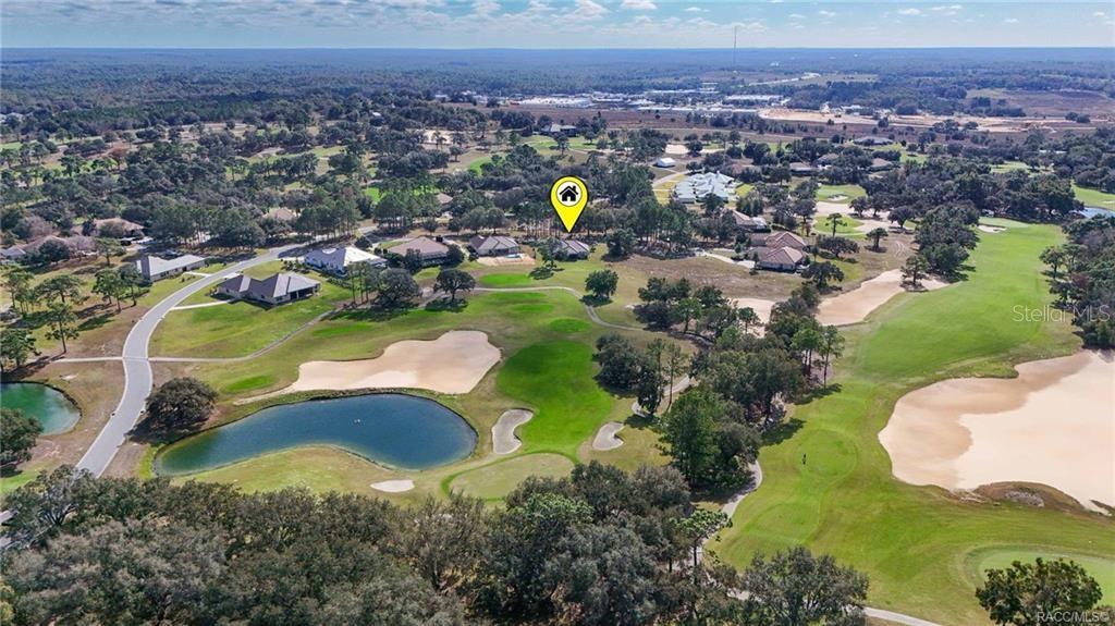 An aerial view shows a house marked with a yellow icon on a golf course — 2788 N CROSSWATER PATH, LECANTO, FL