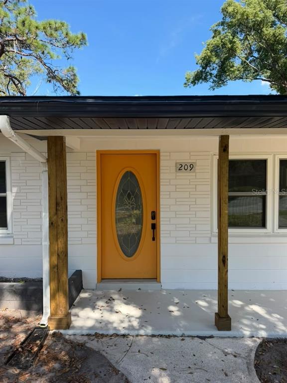 209 PLAZA OVAL, CASSELBERRY, FL — photo 2 of 21