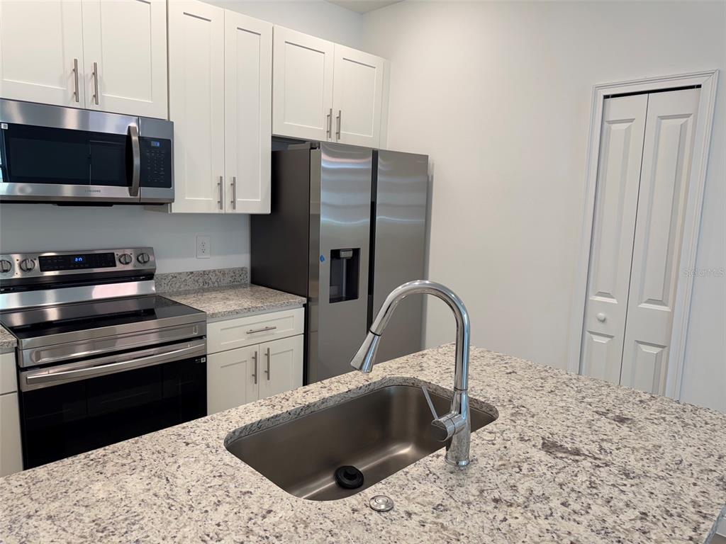 1616 CUMIN DRIVE, POINCIANA, FL — photo 5 of 15