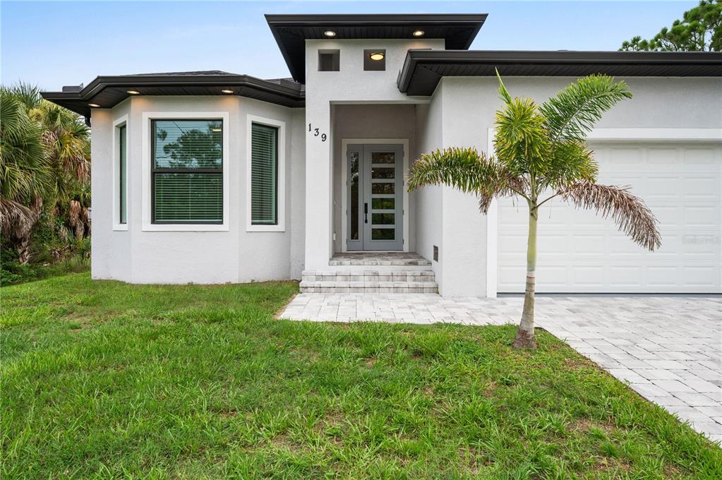 139 SUNSET ROAD, ROTONDA WEST, FL — photo 4 of 30