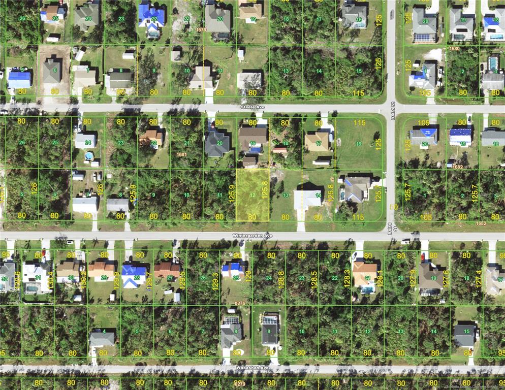 This is an aerial map showing residential lots, streets, and houses in a suburban neighborhood — 18130 WINTERGARDEN (LOT 12) AVENUE, PORT CHARLOTTE, FL