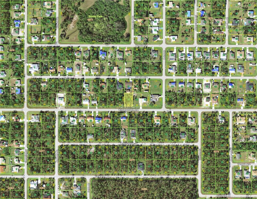 This is an aerial map showing residential lots and streets in a suburban neighborhood — 18130 WINTERGARDEN (LOT 12) AVENUE, PORT CHARLOTTE, FL