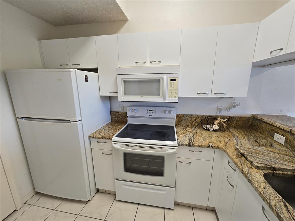 3607 E BAY DRIVE UNIT 206, HOLMES BEACH, FL — photo 5 of 21