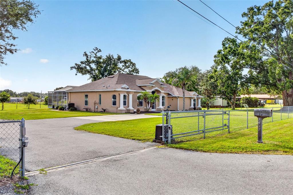 3412 WOLFE ROAD, ZEPHYRHILLS, FL — photo 2 of 30