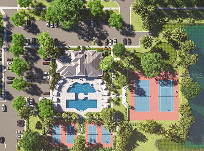 This is a rendering of a community amenity center with a pool and sports courts — 197 STILLWATER DRIVE, FLAGLER BEACH, FL