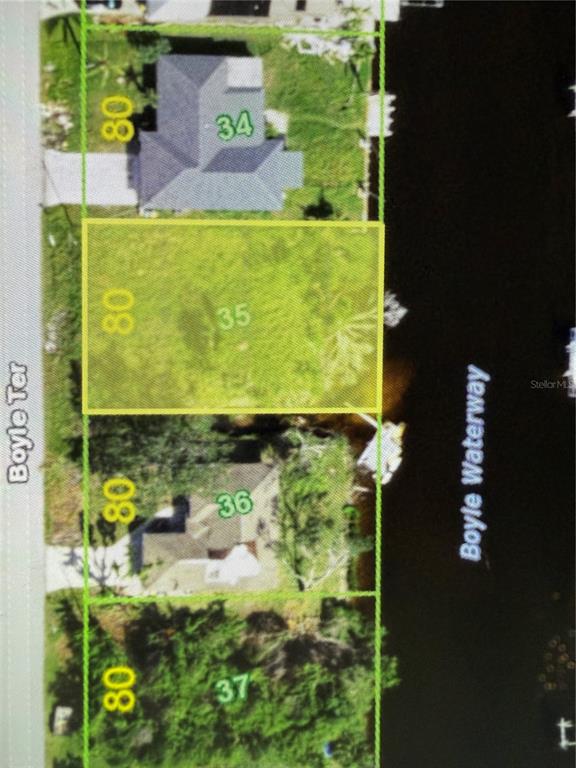 This is a satellite map view showing a vacant residential lot highlighted in yellow — 5226 BOYLE TERRACE, PORT CHARLOTTE, FL