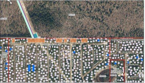 This is a map showing a residential subdivision with numbered lots and surrounding wooded areas — 228 ROME AVE, INTERLACHEN, FL