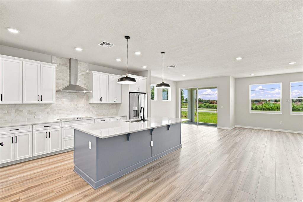 This is a floor plan for a single-story home featuring four bedrooms and a garage — 5027 ORINOCO LANE, ST CLOUD, FL