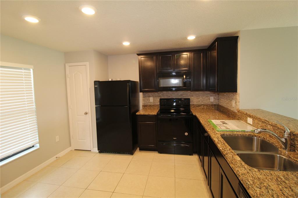1928 PIEDMONT COURT, MASCOTTE, FL — photo 5 of 19