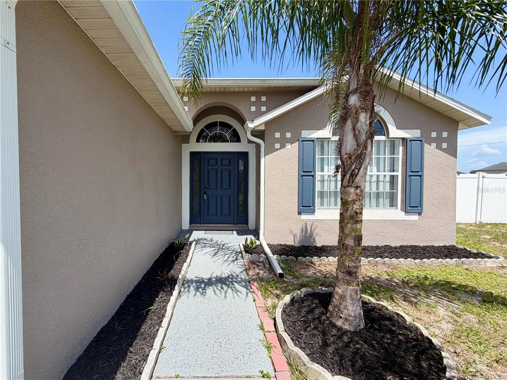 100 CIMARRON LANE, POINCIANA, FL — photo 2 of 30