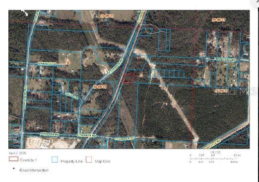 This is an aerial map showing property lines and road intersections in a wooded area — S CHIPPER ROAD, CANTONMENT, FL