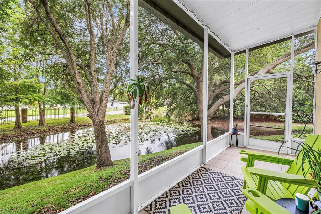 A two-story house with a paved driveway and a basketball hoop in the yard — 2982 ESTANCIA PLACE, CLEARWATER, FL