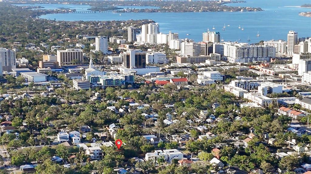 An aerial view shows a residential neighborhood with a red location pin on a property — 1743 8TH STREET, SARASOTA, FL