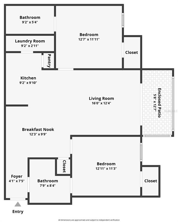 This is a floor plan for a two-bedroom, two-bathroom apartment with an enclosed patio — 940 VILLAGE TRAIL UNIT 6-103, PORT ORANGE, FL