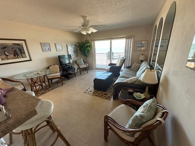A view of the ocean and sandy beach taken from underneath a beach umbrella — 2700 OCEAN SHORE BOULEVARD UNIT 504, ORMOND BEACH, FL