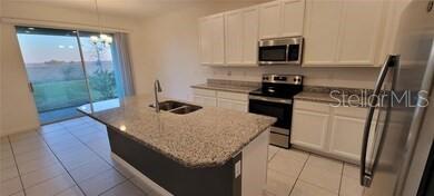 109 TRINITY RIDGE CIRCLE, DAVENPORT, FL — photo 5 of 11