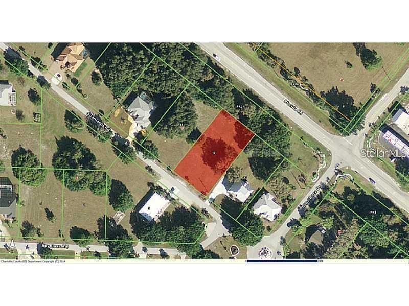 An aerial map shows a highlighted rectangular residential lot situated between two roads — 120 SPANIARDS ROAD, PLACIDA, FL