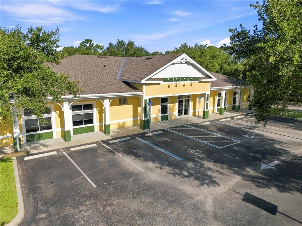 This is an architectural rendering of the exterior side view of a single-story building — 191 ENDICOTT WAY, DELAND, FL