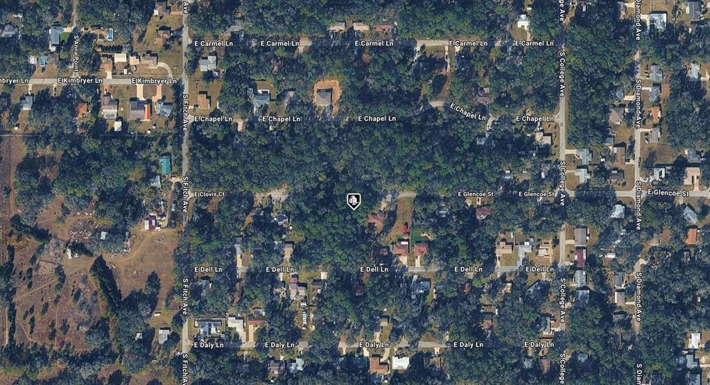 This is an aerial map view of a residential neighborhood with tree-covered lots — 6034 E GLENCOE STREET, INVERNESS, FL