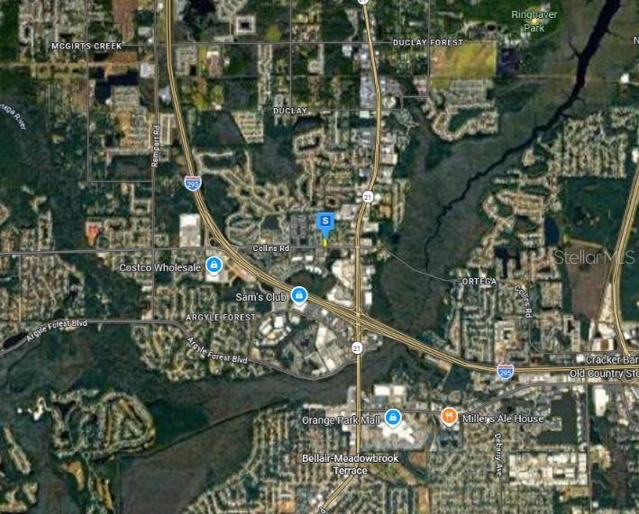 This is an aerial map showing the location of a property near major highways — 6221 COLLINS ROAD, JACKSONVILLE, FL