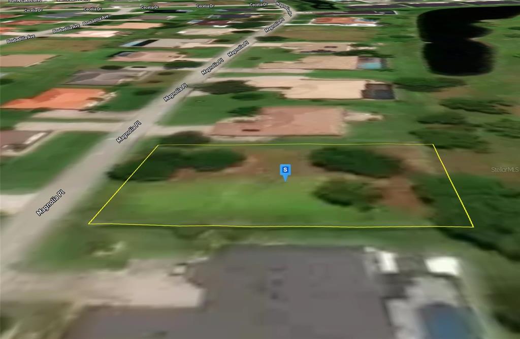 An aerial view shows a vacant, rectangular residential lot outlined in yellow along a paved road — 5016 MAGNOLIA PLACE, SEBRING, FL