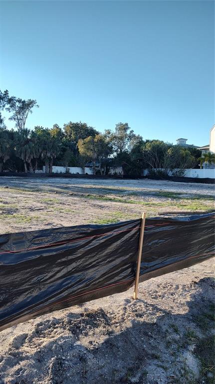 A vacant, cleared residential lot with rocky soil and a tall, thin pine tree — 372 12TH AVENUE, INDIAN ROCKS BEACH, FL