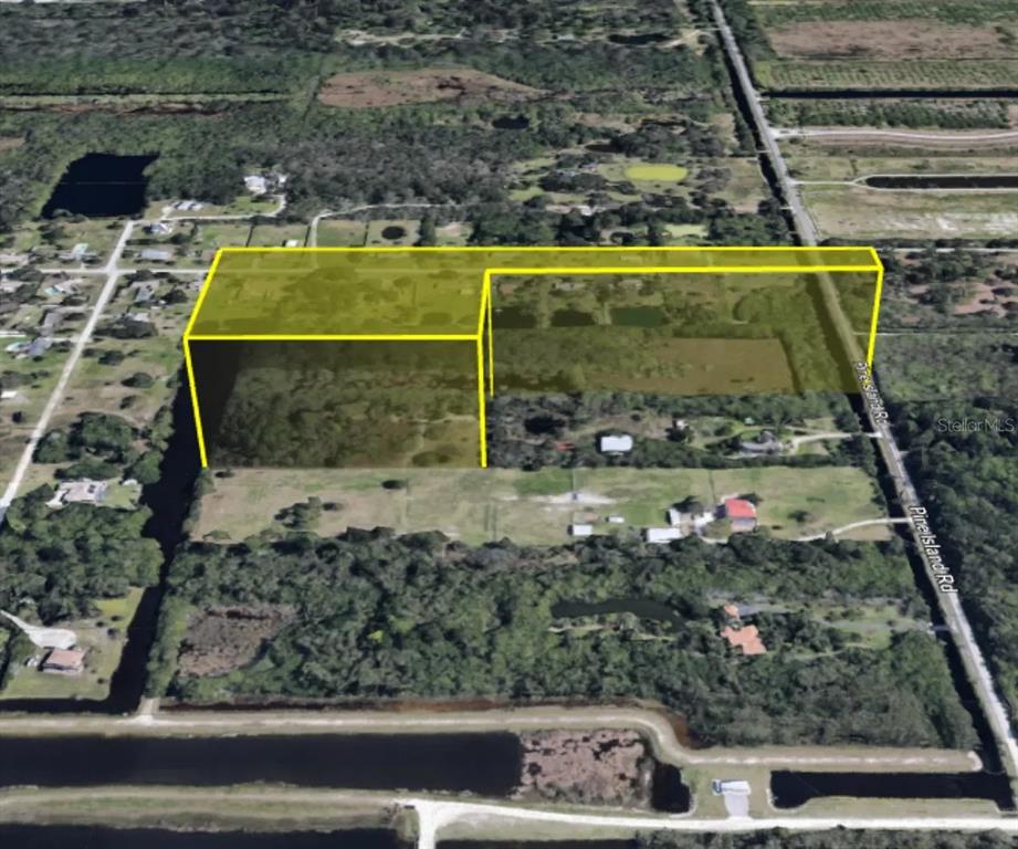An aerial view shows a large, L-shaped plot of land highlighted in yellow — TBD PINE ISLAND ROAD, MERRITT ISLAND, FL