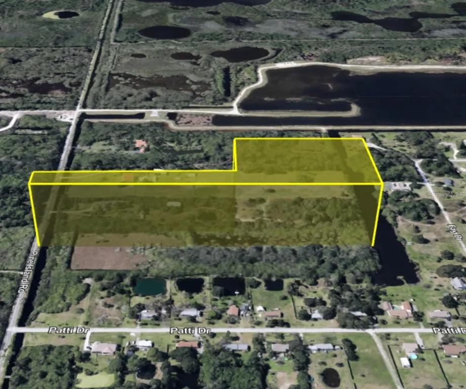 An aerial view shows a large, undeveloped plot of land highlighted with a yellow overlay — TBD PINE ISLAND ROAD, MERRITT ISLAND, FL