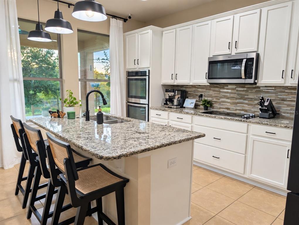 1119 FOUNTAIN COIN LOOP, ORLANDO, FL — photo 3 of 42