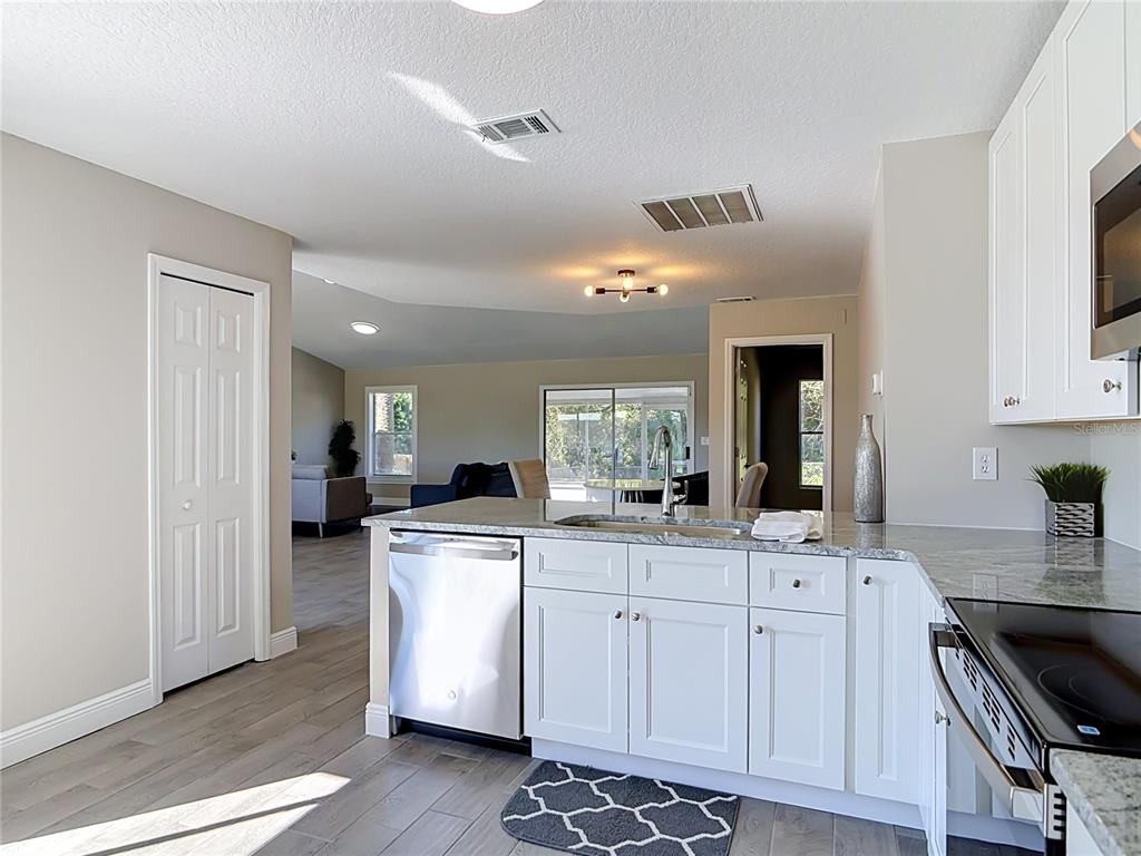 3025 FOXBORO CIRCLE, DELTONA, FL — photo 2 of 68