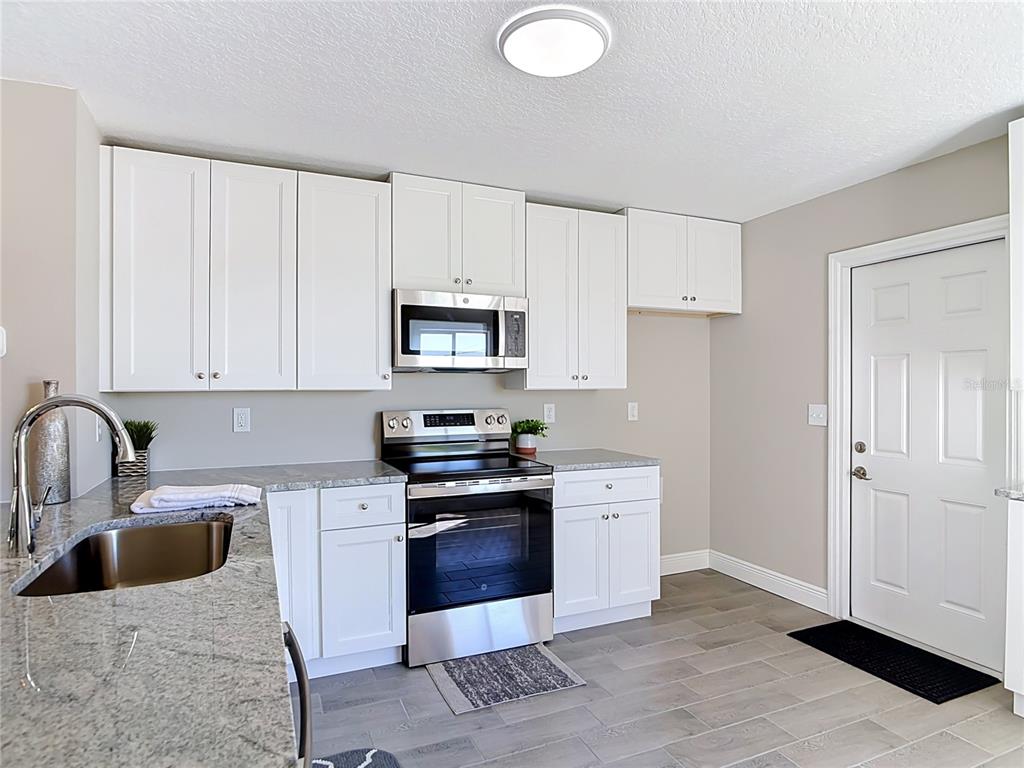 3025 FOXBORO CIRCLE, DELTONA, FL — photo 4 of 68