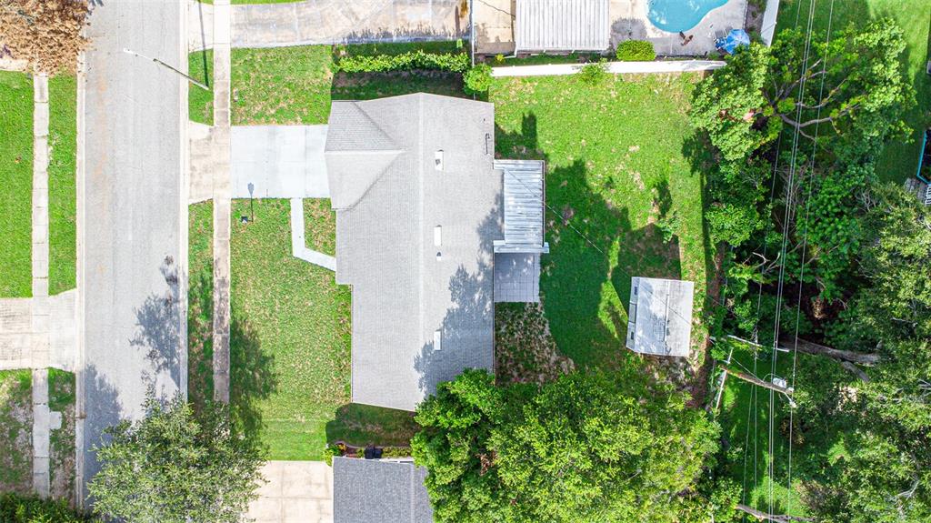 An aerial view shows a house with a gray roof, a driveway, and a backyard — 620 BURKE STREET, ALTAMONTE SPRINGS, FL