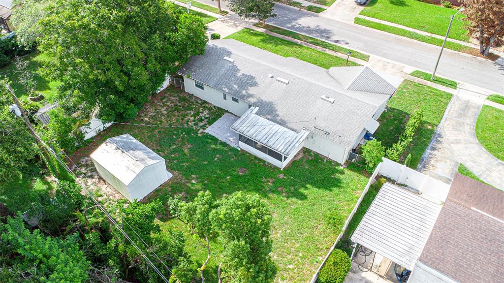 An aerial view shows a house with a backyard, a shed, and a screened patio — 620 BURKE STREET, ALTAMONTE SPRINGS, FL