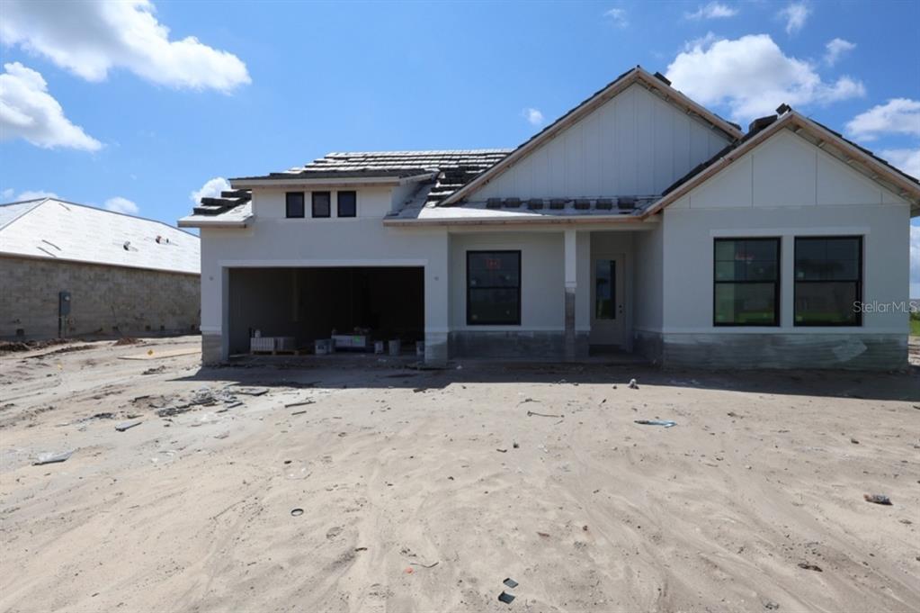 This is a floor plan for a single-story house with four bedrooms and a garage — 17676 FOXTAIL LOOP, VENICE, FL