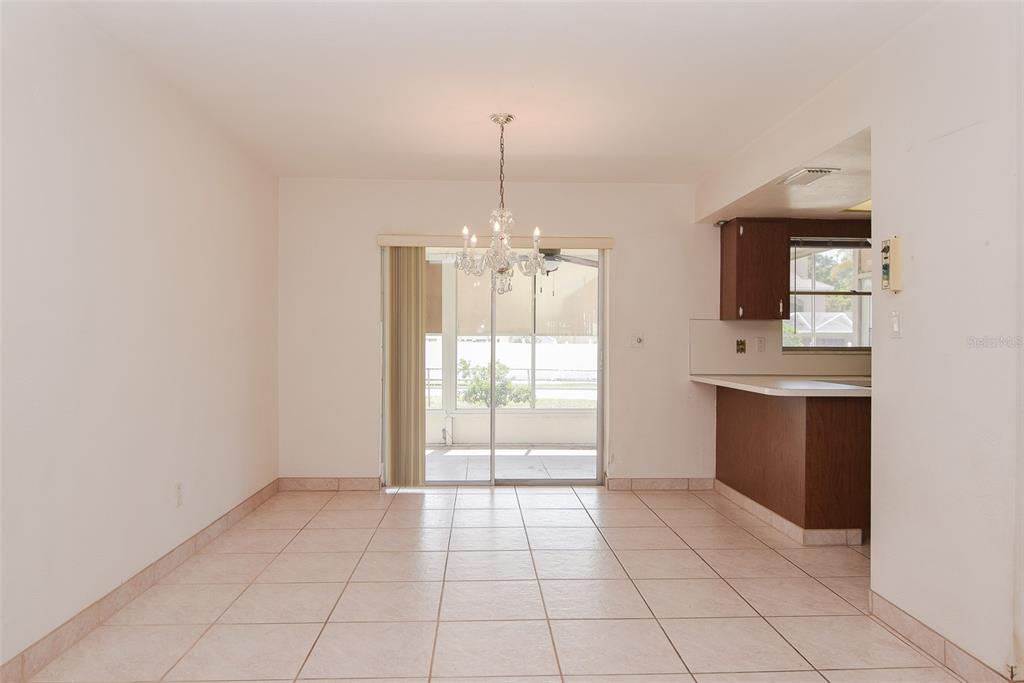 13594 MONALEE AVENUE, SEMINOLE, FL — photo 5 of 24
