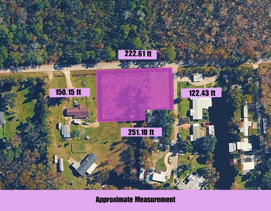 An aerial map shows a highlighted rectangular plot of land with its boundary dimensions labeled — 110 JESSE ROAD, ST AUGUSTINE, FL